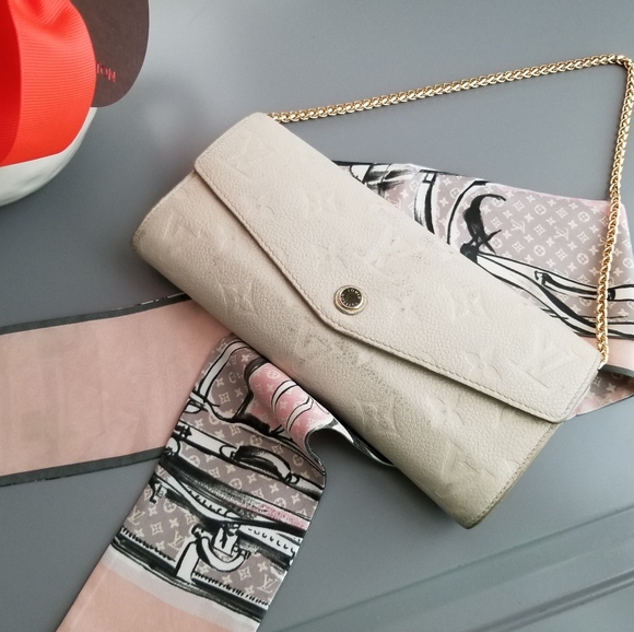 LOUIS VUITTON Portefeuille Empreinte Neige Mono - Picture 12 of 16